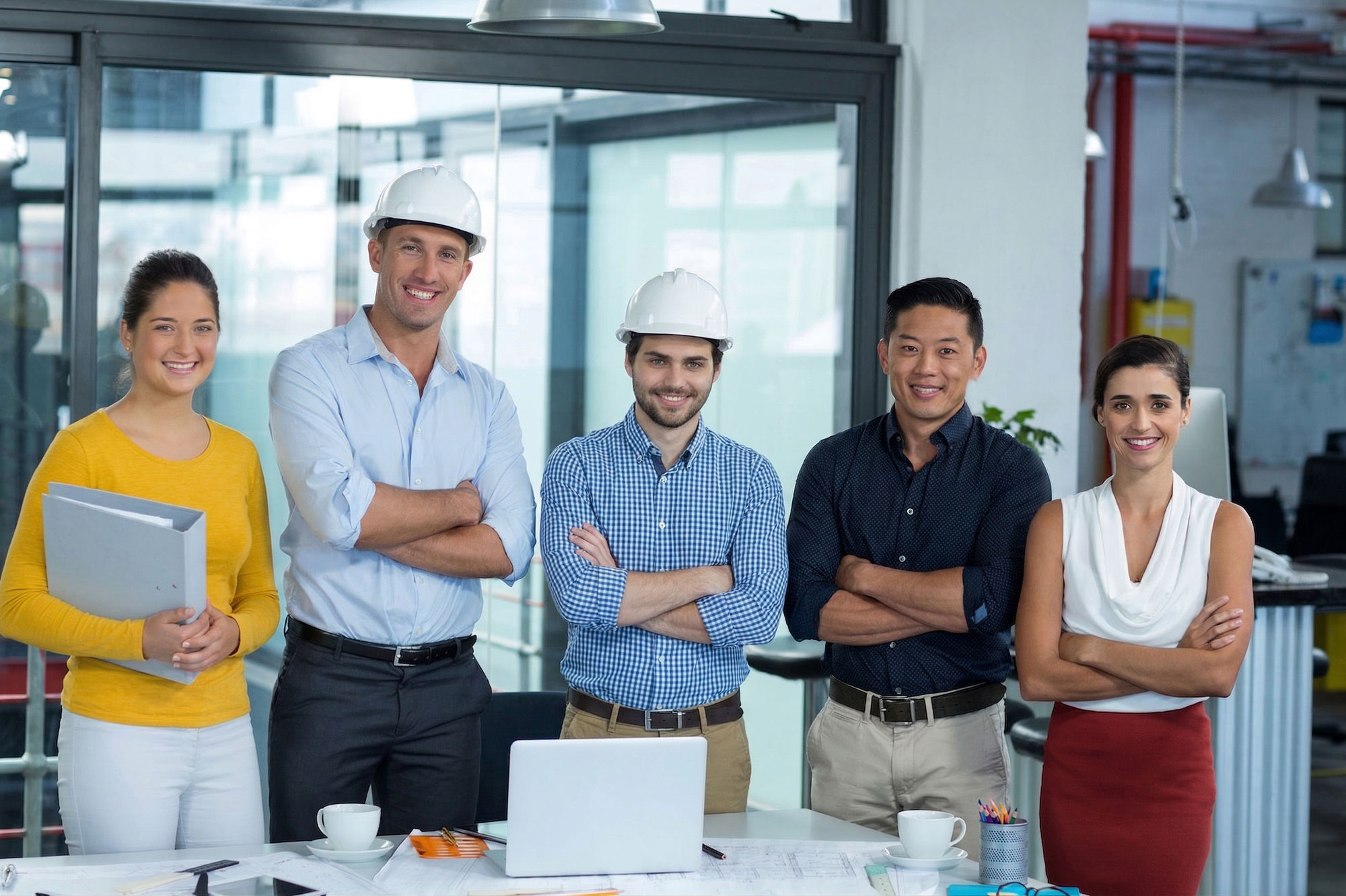 Close up of a team standing together ready to work