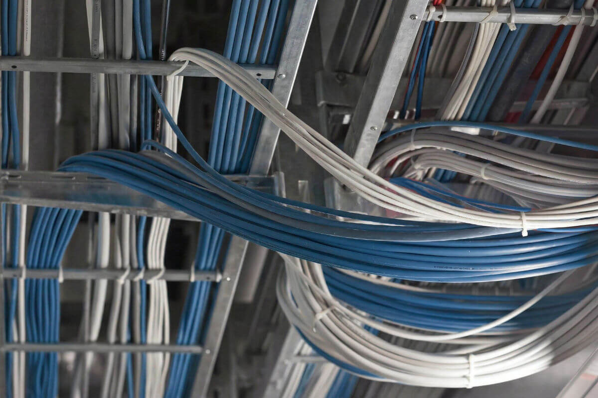 Neatly organized network cables in orange and white